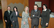Group photo of partners and associates of law firm Greig Wilson Rasmussen in Surrey